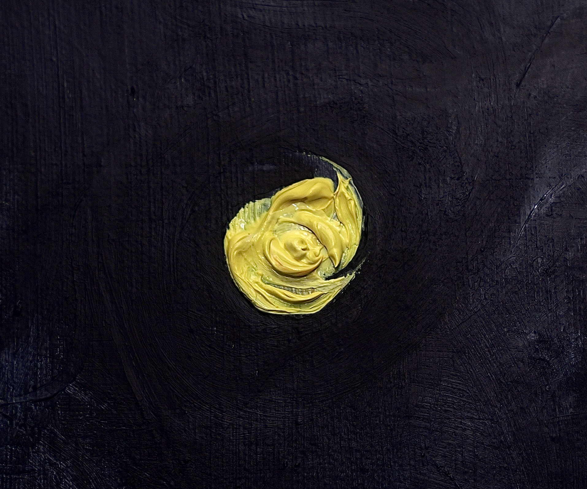 Eclipse Night — close detail of the moon, a thick swirl of yellow paint on a deep violet-black ground.